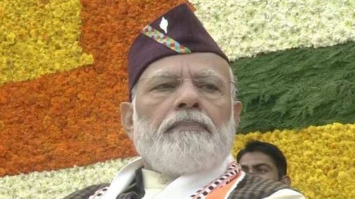 PM Modi wearing traditional Uttarakhand cap
